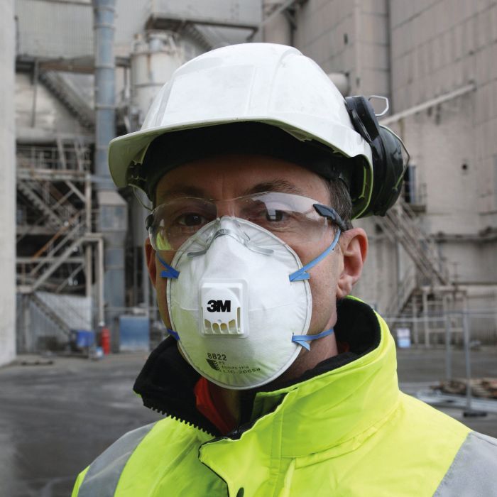 Workman with white hard hat wearing  a 3M 8822 Disposable Respirator Classic Cup Valved P2 with clear protective eye glasses