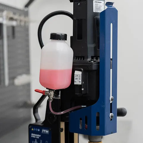 Holemaker Pro55 Magnetic Base Drill – Side-mounted coolant bottle and delivery hose