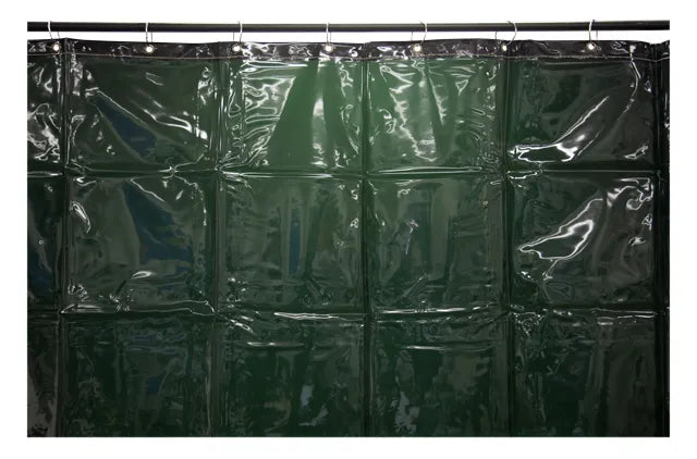 Welding Curtain 1.8 × 5.5 m – Green curtain hanging from rings, showing reinforced top edge and eyelets