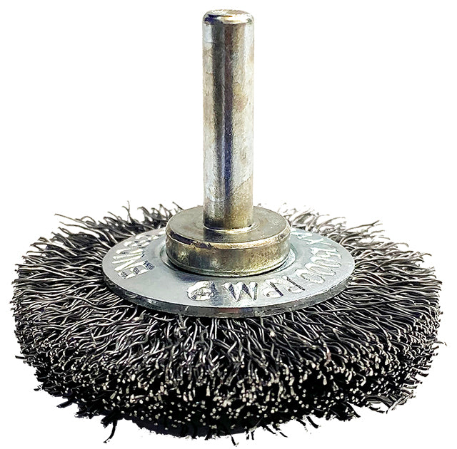 A steel spindle mount wheel brush with a shiny metallic finish and crimped bristles.