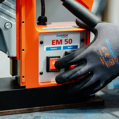 em50 magnetic drill excision person pushing button 