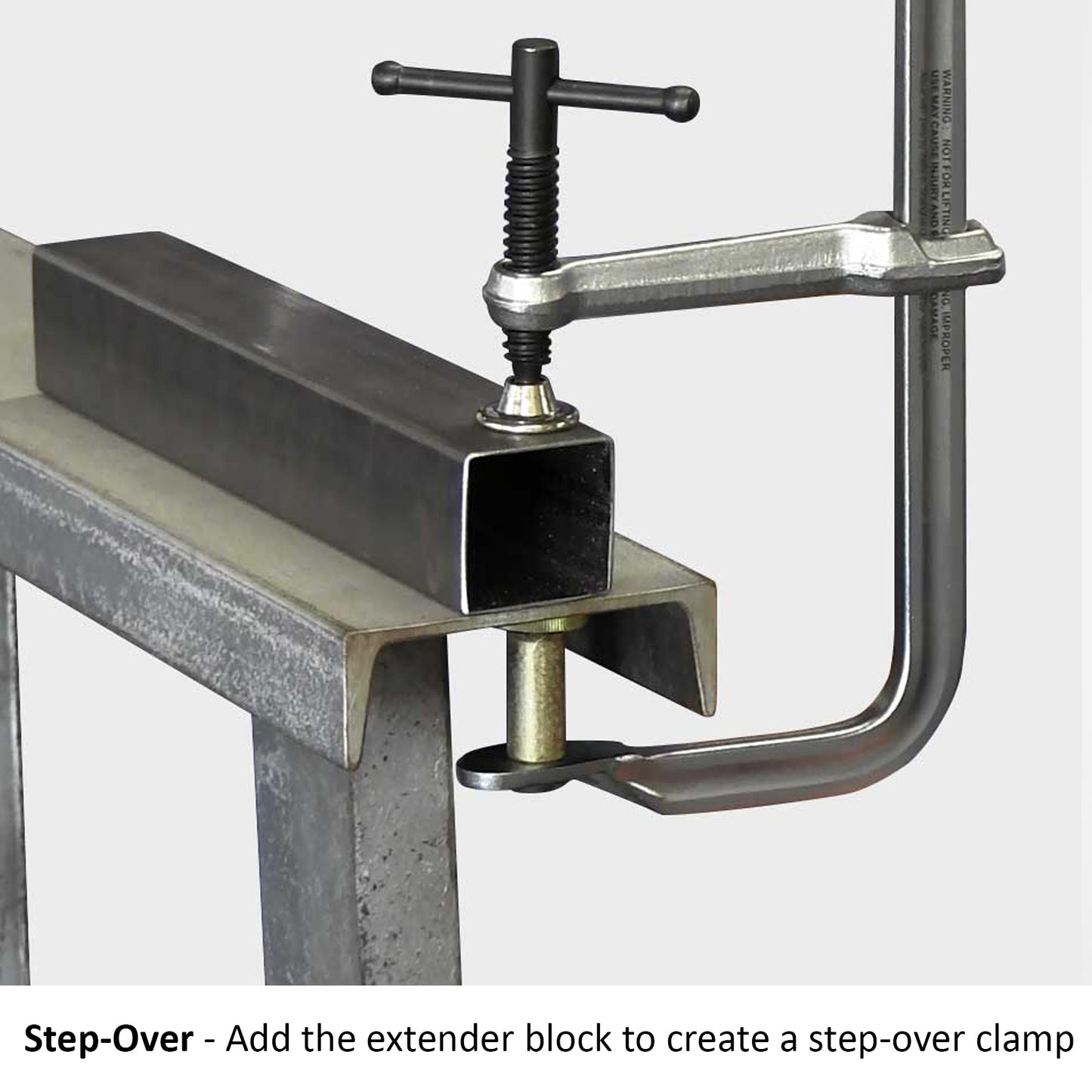 add the extender block to create a step over clamp 